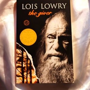 "The Giver" by Lois Lowry. Published by Random House